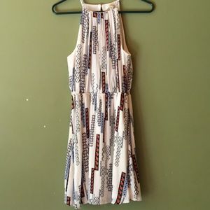 Fun print mini dress with small keyhole back.